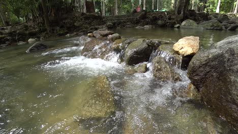 Very-relaxing-tropical-water-stream-at-Ulu-Bendul,-Malaysia,-Negeri-Sembilan