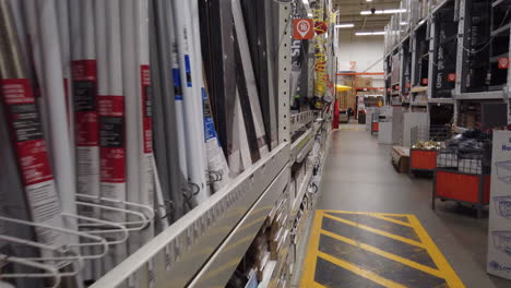 Walking-down-an-aisle-at-a-home-improvement-big-box-store