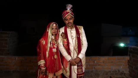 Groom-and-Bride-in-Indian-traditional-wedding-dress