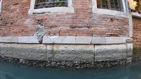 Taking-a-gondola-ride-in-Venice,-Italy-is-a-must-when-you-visit-this-city