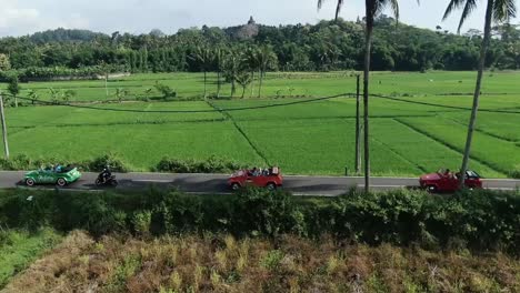 VW-Cabrio-tour-driving-amid-rural-countryside-to-Borobudur-temple-Java-Indonesia