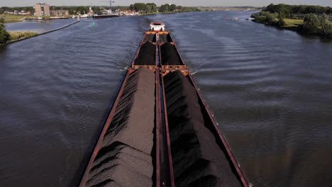 Aerial-Along-Oude-Maas-With-Veerhaven-XI-Ship-Transporting-Loose-Cargo