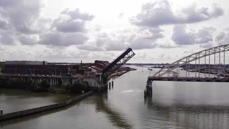 Aerial-View-Of-Opened-Bascule-Bridge-Over-Noord-River