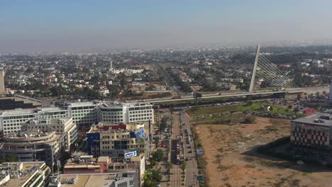 Toma-Aérea-De-Casablanca-Con-Vistas-Al-Puente-Atirantado-De-Sidi-Maarouf.