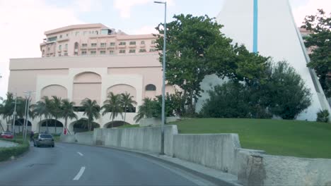 Driving-through-the-hotel-zone-on-Kukulcan-avenue-in-Cancun-Mexico-on-a-sunny-afternoon