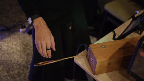 Closeup-of-hands-playing-electronic-style-electromagnetic-antenna-based-instrument