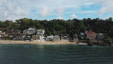 Beautiful-Bingin-beach-and-cliff-drone-footage-in-Bali