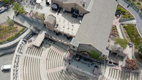 Aerial-view-overlooking-the-Winery-Deck-and-the-Concert-Bowl,-at-the-Paul-Masson-Winery,-in-Santa-Cruz-Mountains,-in-Saratoga,-California---tilt,-drone-shot