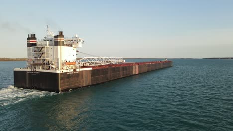 Follow-dolly-shot-of-a-Freighter-on-Detroit-River,-Aerial-view-drone-shot,-USA