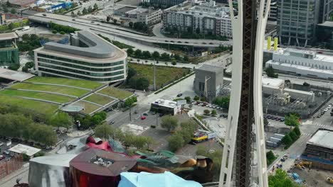 Rising-aerial-view-of-the-Seattle-Space-Needle's-elevator-system