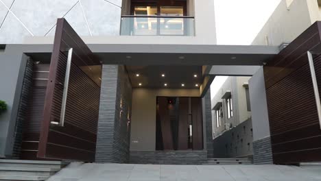 POV-Walking-Towards-Entrance-Of-Luxury-Modern-Home-In-Karachi-From-Driveway