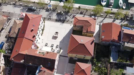 An-aerial-view-over-Skradin-town-square-with-marina-and-distant-Krka-bridge