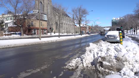 A-lot-of-cars-are-passing-by-on-Rene-Levesque-street-in-Montreal