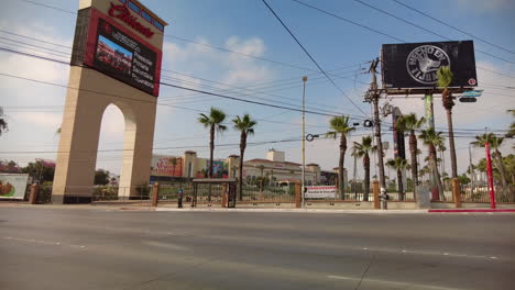 Light-Traffic-At-The-Highway-Near-Caliente-Casino-And-Hypodrome-Racetrack-In-Tijuana,-Mexico