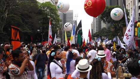 masked-protesters-on-rally-against-brazilian-president-in-Paulista-avenue,-OUT-Bolsonaro