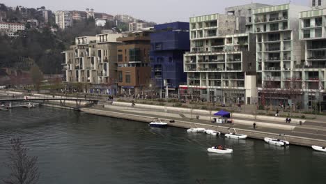 Beautiful-neighborhood-in-Lyon-France,-residential-buildings-on-Saône-river-bank