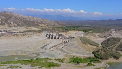 Aerial-View-Flying-Towards-Large-Scale-Dam-Development-Project-for-Hydroelectric-power-and-Environmental-Conservation,-Dominican-Republic