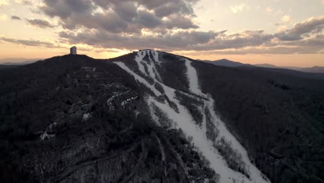 aerial-tilt-up-at-sunset-sugar-mountain-ski-resort-near-banner-elk-nc,-north-carolina-and-boone-and-blowing-rock-nc,-north-carolina