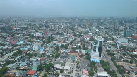 Victoria-Island-Lagos,-Nigeria---20-Feb-2022:-drone-view-of-cars-and-traffic-on-Ahmadu-Bello-Way,-Victoria-Island-Lagos