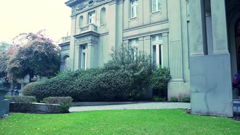 Pan-right-of-the-entrance-of-the-Bruna-Palace,-current-headquarters-of-the-National-Chamber-of-Commerce,-Services-and-Tourism-of-Chile,-Santiago,-Chile