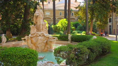 Venice-Marries-the-Sea-Fountain-In-The-Courtyard-Of-Palazzo-Venezia,-Rome,-Italy---panning-shot