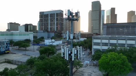 Cellular-signal,-cell-tower-theme-in-downtown-urban-city-in-USA