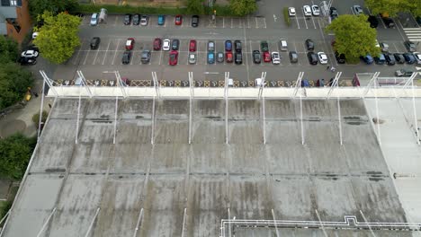 Birds-eye-view-of-a-small-supermarket-car-park