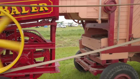 A-working-vintage-steam-powered-hay-baler-in-action