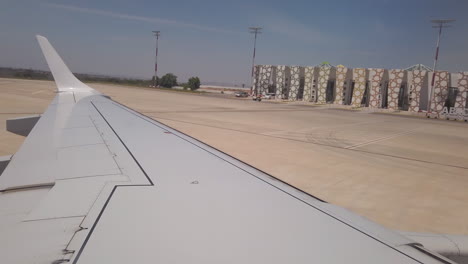 View-from-the-hublot-inside-of-an-aircraft-arriving-in-front-of-the-terminal-building-at-Fez-airport-in-Morocco