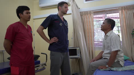 Doctor-talking-to-Cambodian-patient