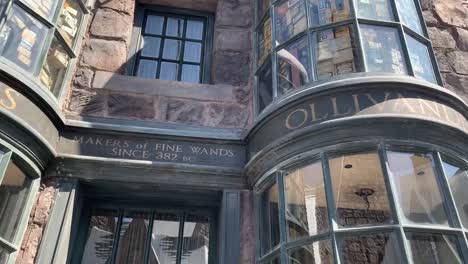 An-exterior-shot-of-Ollivanders-Wand-Shop---"Makers-of-Fine-Wands"-based-off-the-best-selling-"Harry-Potter"-book-series-by-famous-author,-J