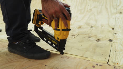 Batch-punching-screws-into-wooden-ramp-closeup