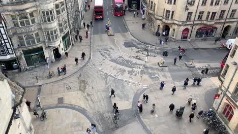 This-high-angle-view-of-the-intersection-between-High-Street-and-Cornmarket-in-Oxford-is-taken-from-the-top-of-Carfax-Tower