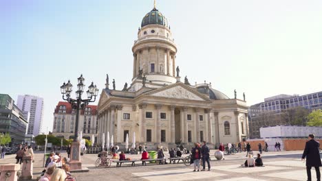 People-Relaxing-on-Public-Square-in-Berlin-at-Beautiful-Gendarmenmarkt