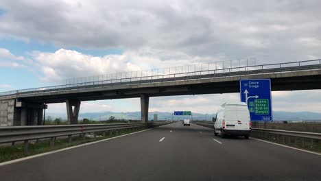 Side-road-on-sunny-day-and-blue-cloudy-sky-with-no-person