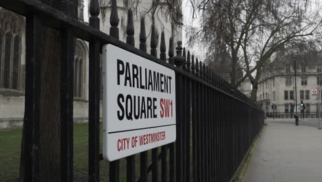 Parliament-Square-Road-Sign-On-Railings-Beside-Westminster-Hall-In-London