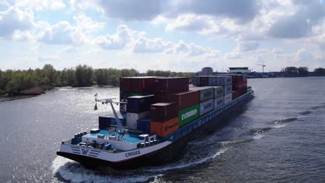 Cargo-Ship-Of-Crigee-Sails-In-Puttershoek-During-Daytime