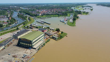 Aerial-of-small-harbor-located-near-industrial-terrain