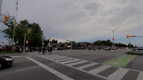 Groups-of-people-cross-the-street-for-the-tribute-to-the-victims-of-a-terror-attack-by-a-terrorist-in-London-Ontario