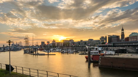 Golden-sunset-over-Hamburg-city-skyline-in-timelapse-shot