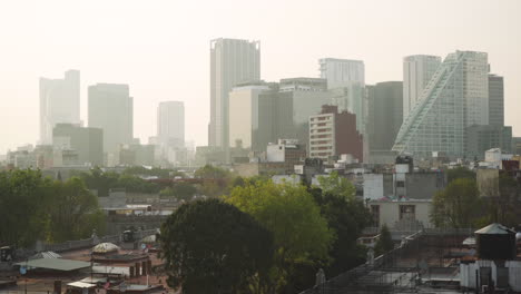 Mexico-City-skyline-with-traditional-rooftops-and-skyscrapers-of-Paseo-de-la-Reforma