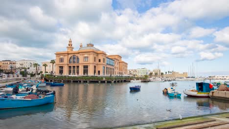 Time-lapse-of-Museum-and-Theater-Margherita,-next-ot-a-harbor-in-the-Bari-seaside,-Italy