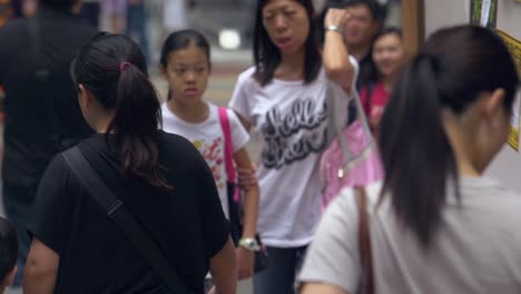 Asian-womans-extremely-slow-motion-close-up-footage-inside-a-shopping-mall