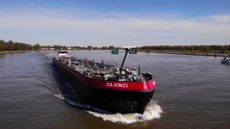 Aerial-Drone-View-Of-Forward-Bow-Of-Da-Vinci-Motor-Tanker-Ship-Approaching-Along-Oude-Maas