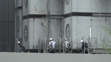 Demolition-works-continue-at-Tokyo's-iconic-Nakagin-Capsule-Tower-in-Ginza-on-April-16,-2022,-in-Tokyo,-Japan