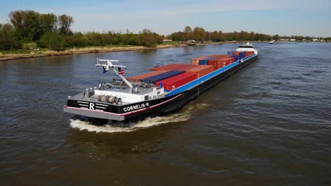 Aerial-View-Of-Cornelis-R-Cargo-Ship-Navigating-Along-Oude-Maas-On-18-April-2022