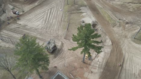 Aerial-Drone-shot-of-dirt-bike-track,-during-motos