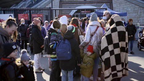 Ukrainian-families-who-escaped-from-the-war-queue-up-at-the-registration-center-on-the-National-Stadium-in-Warsaw-to-receive-a-Polish-social-security-number