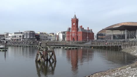 Panning-Shot-of-Mermaid-Quay-showing-Millennium-Centre,-Pier-Head-and-Senedd