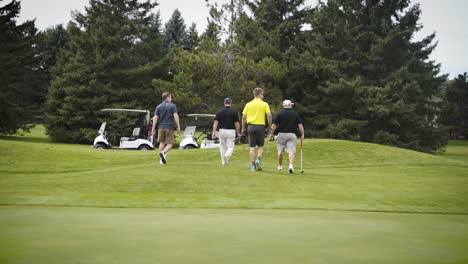 Group-of-golferâ€™s-walking-off-of-a-golf-course